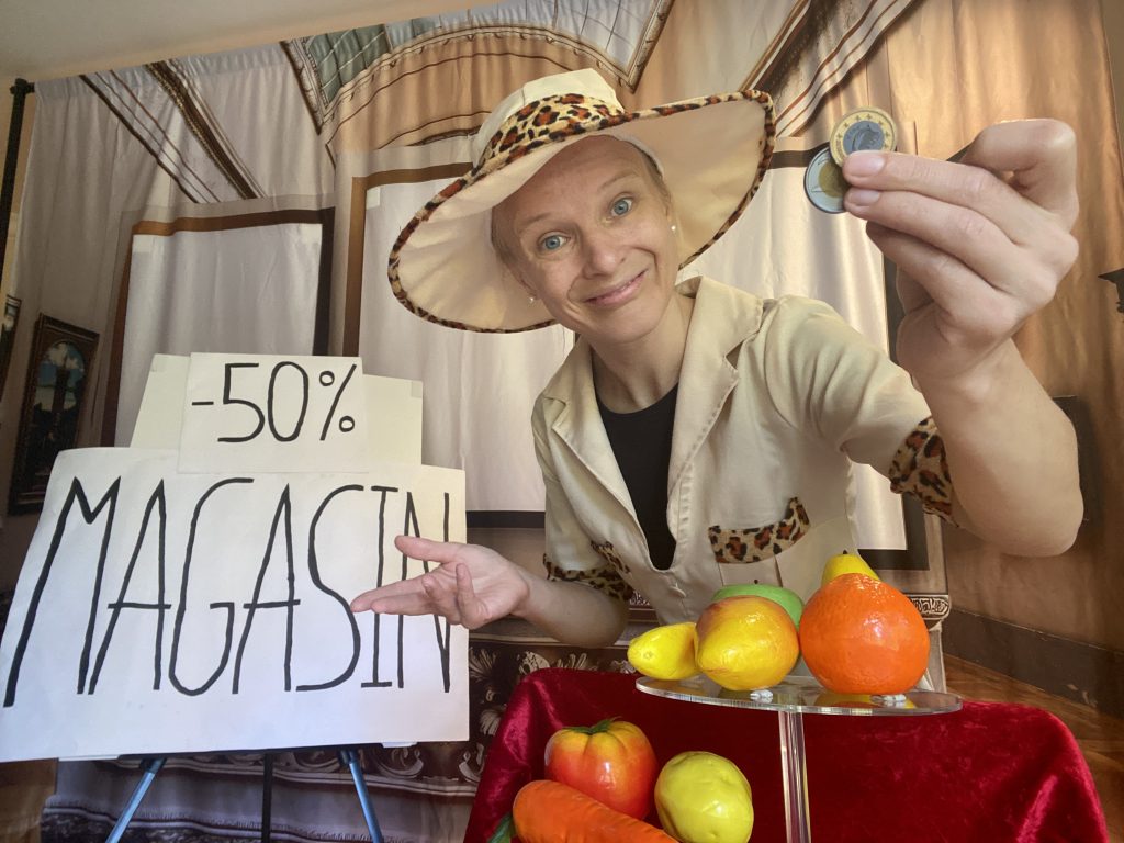 The French explorer is selling fruits and vegetables.